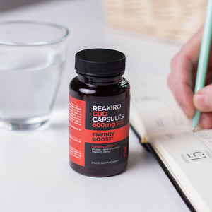 Reakiro Energy boost CBD Capsules in use