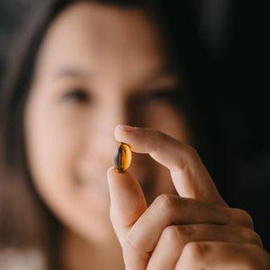 Reakiro CBD Capsules 300mg in use